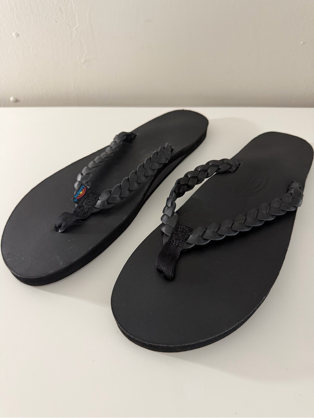 Rainbow Twisted Sister Black Braided Leather Flip Flops like new women 9.5-10.5